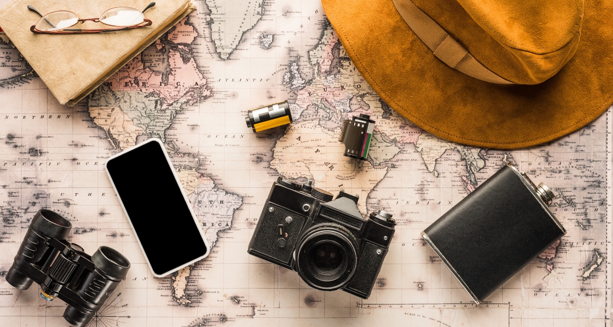 Travel essentials on a map